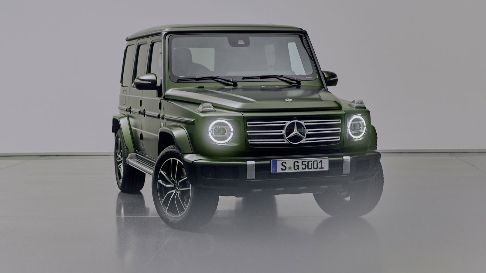 A green Mercedes-Benz G500 G-Class