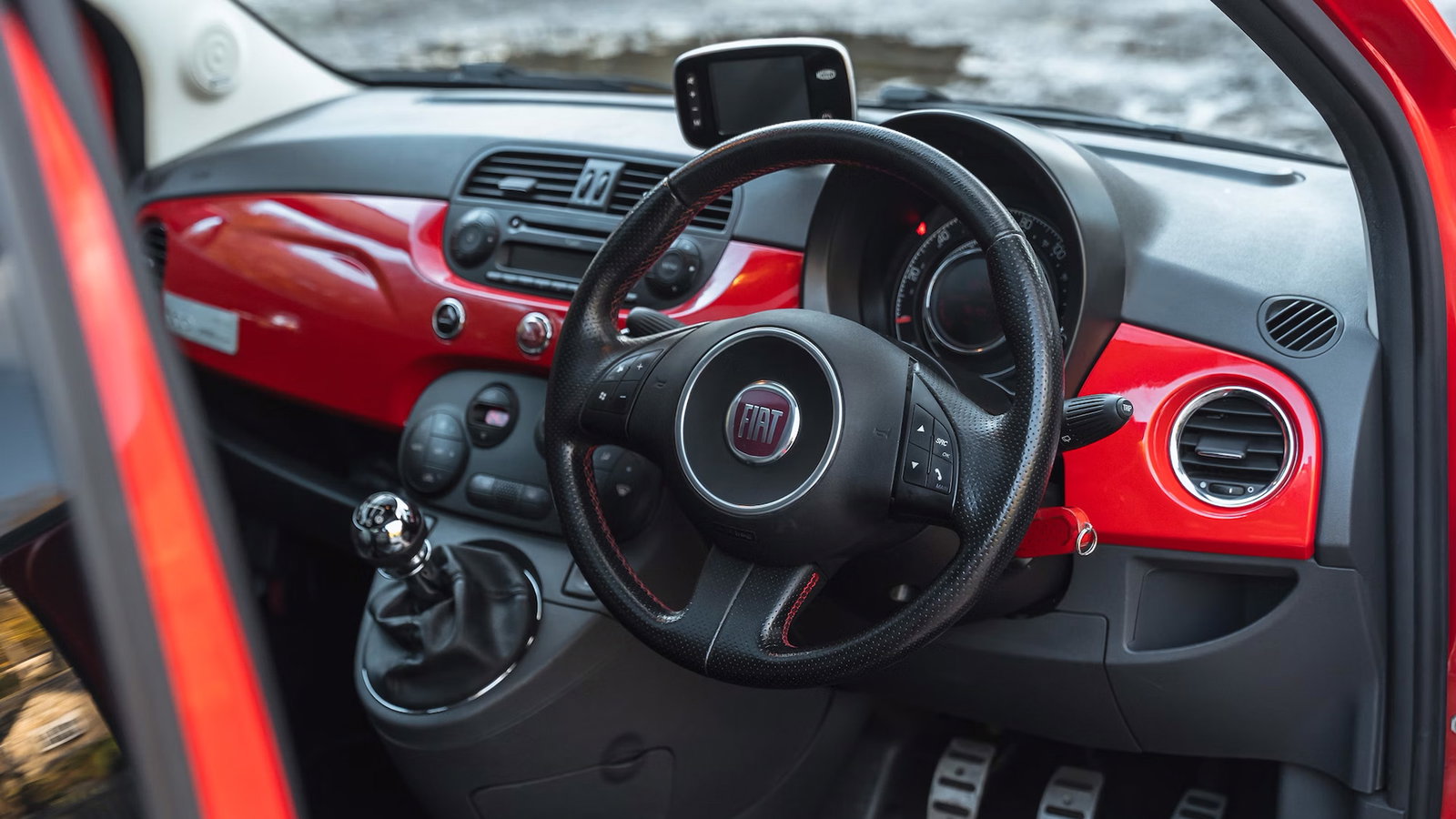 There's even a Rosso Corsa dash insert
