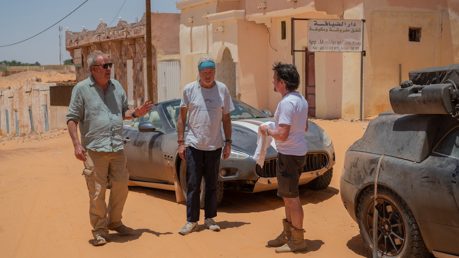 Jeremy Clarkson, Richard Hammond and James May in The Grand Tour: Sand Job