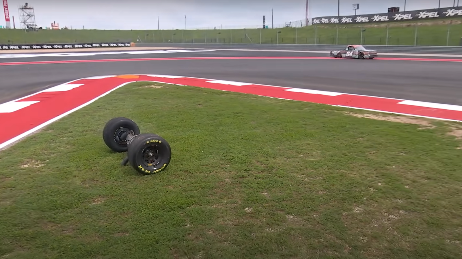Watch A NASCAR Truck Lose Its Rear Axle Mid-Race | CarThrottle