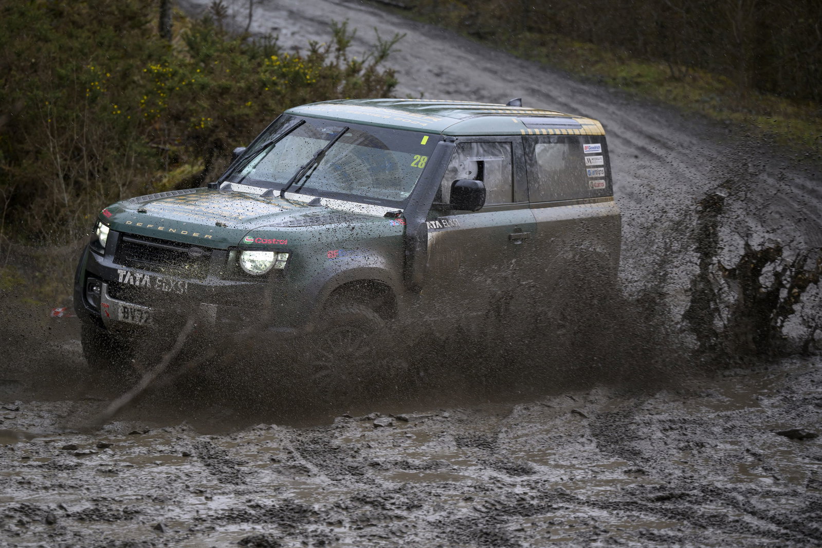 Bowler Defender, front 3/4, driving