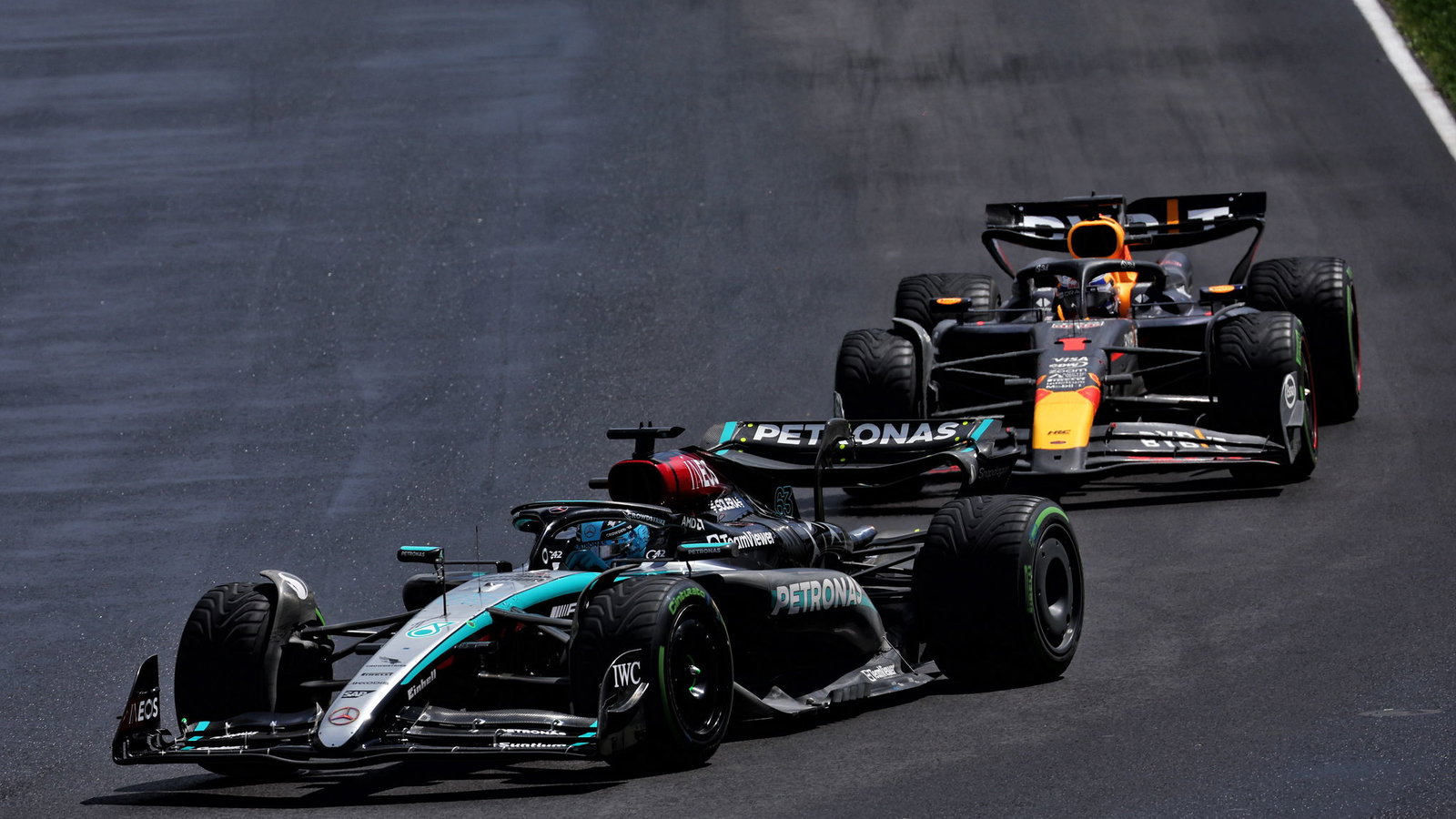 George Russell and Max Verstappen at the 2024 Canadian Grand Prix