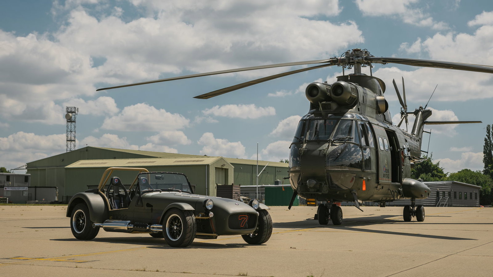 Caterham RAF 360 with Puma helicopter - front
