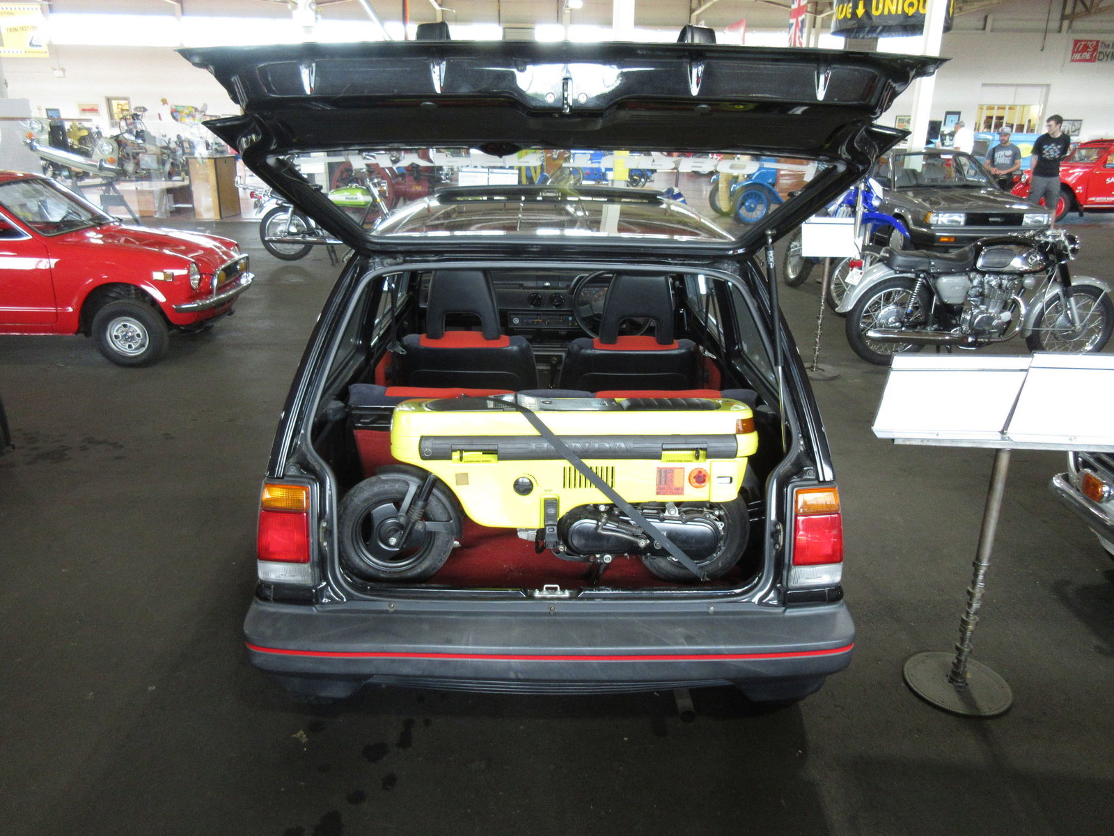 Honda Motocompo in the boot of a Honda City