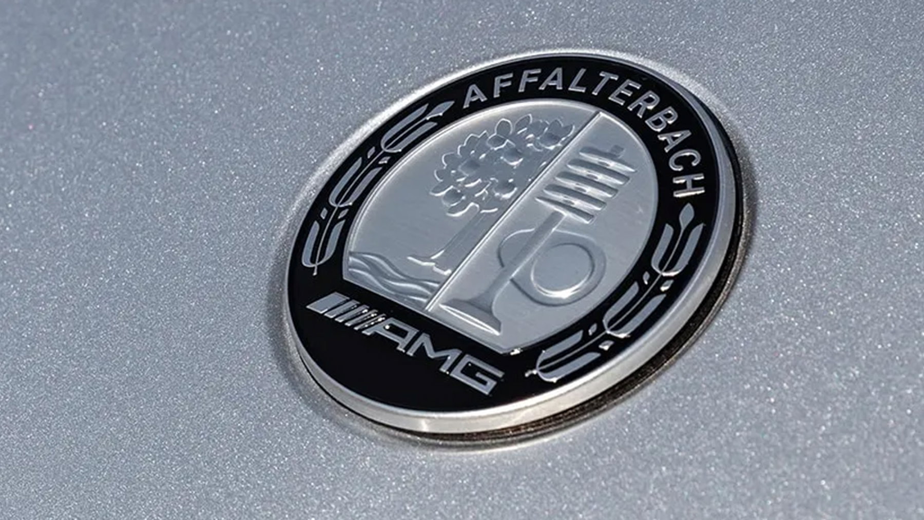 Why Does The AMG Badge Have A Tree On It? | CarThrottle