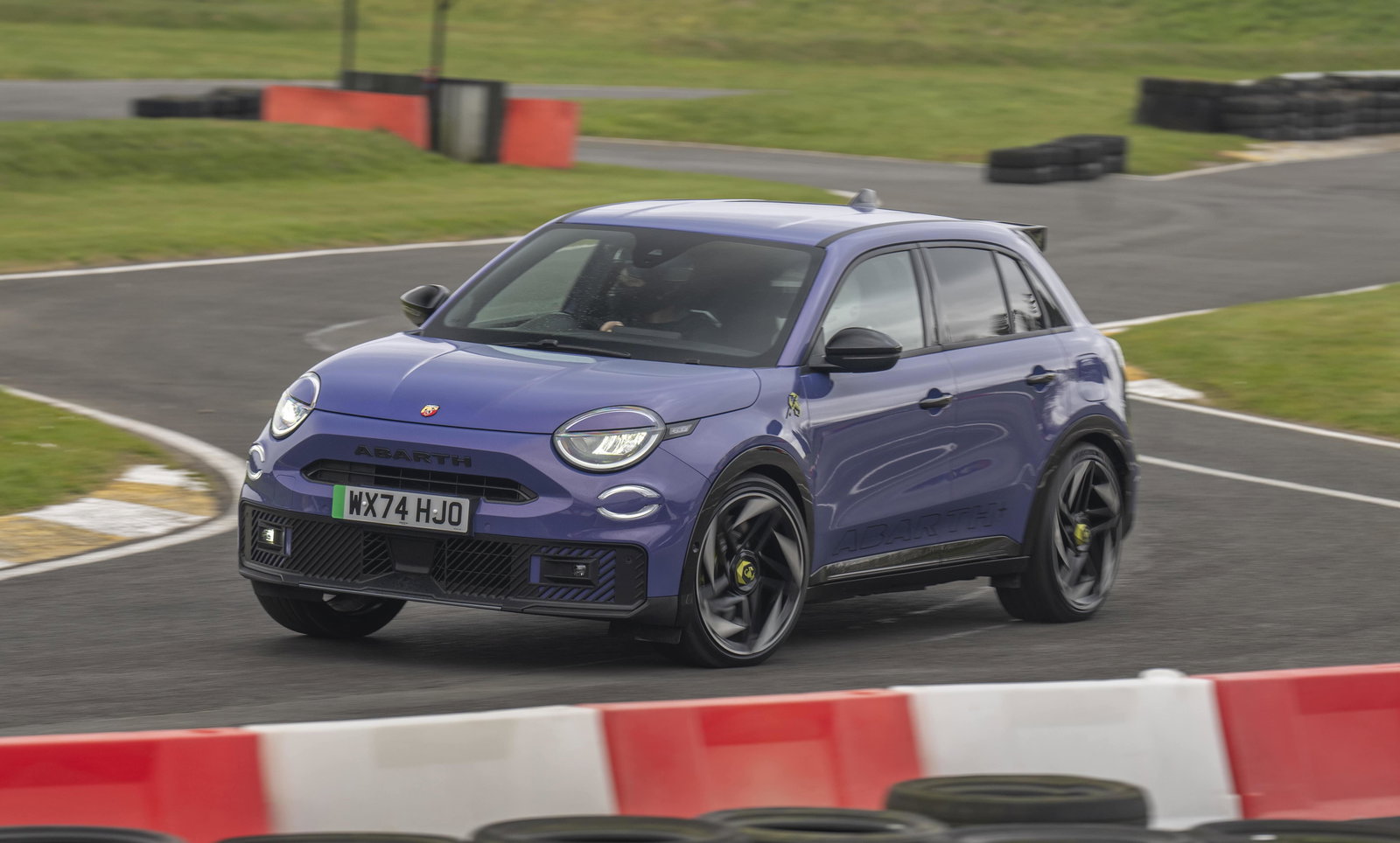 Abarth 600e - front, driving