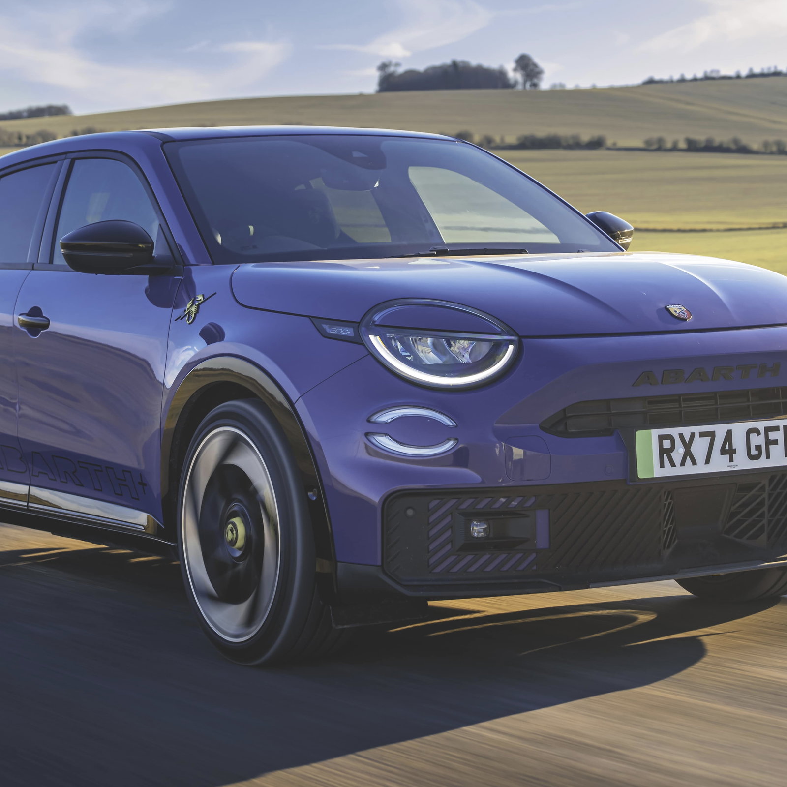 Abarth 600e - front, driving