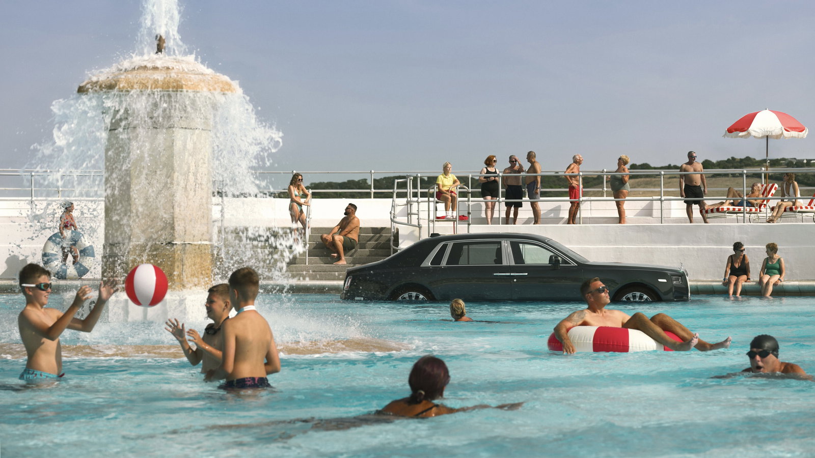 Rolls-Royce Phantom in a swimming pool - side