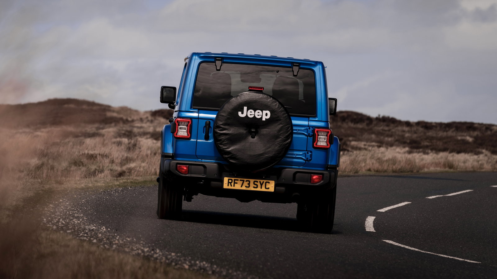 Jeep Wrangler - rear, driving