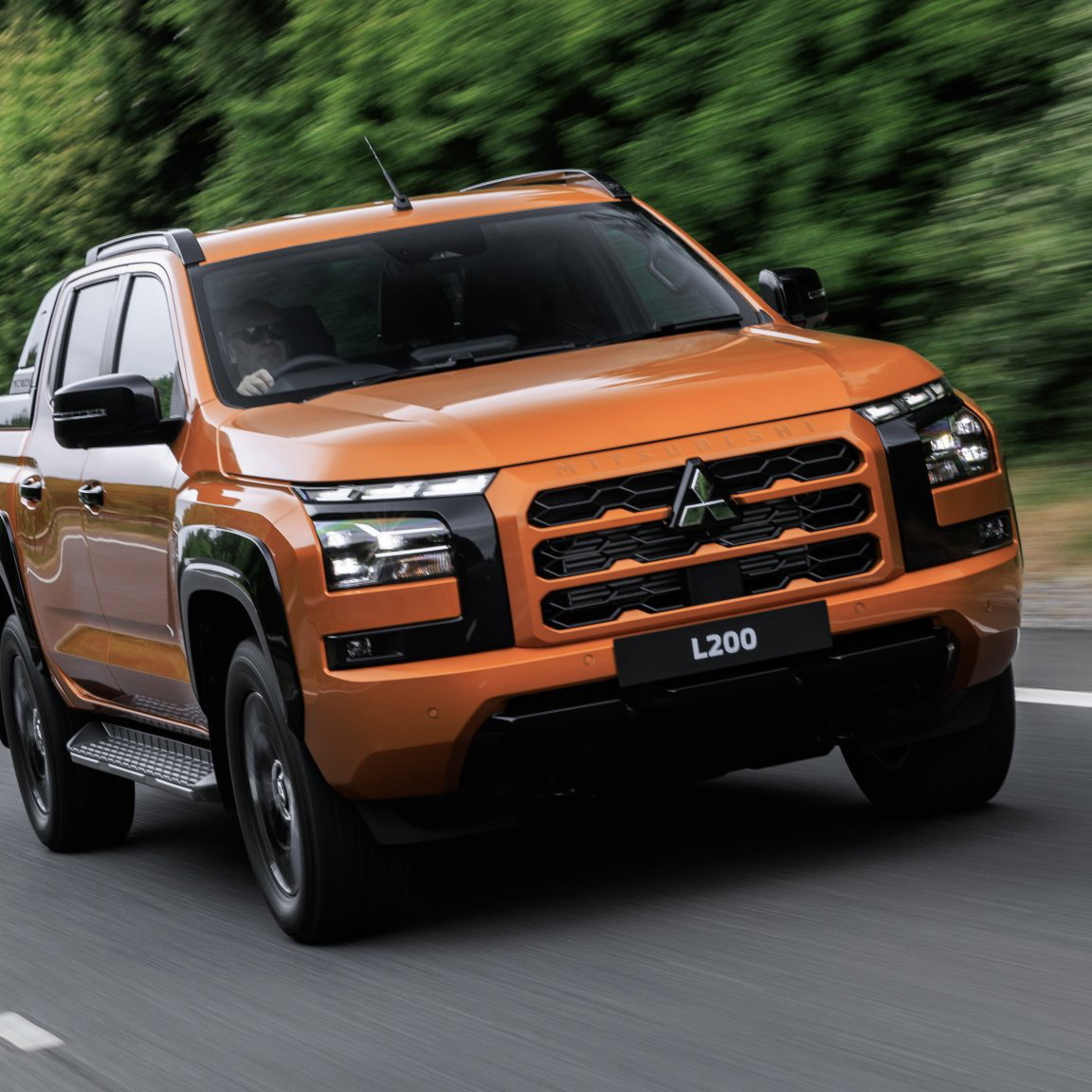 2026 Mitsubishi L200 - front, driving