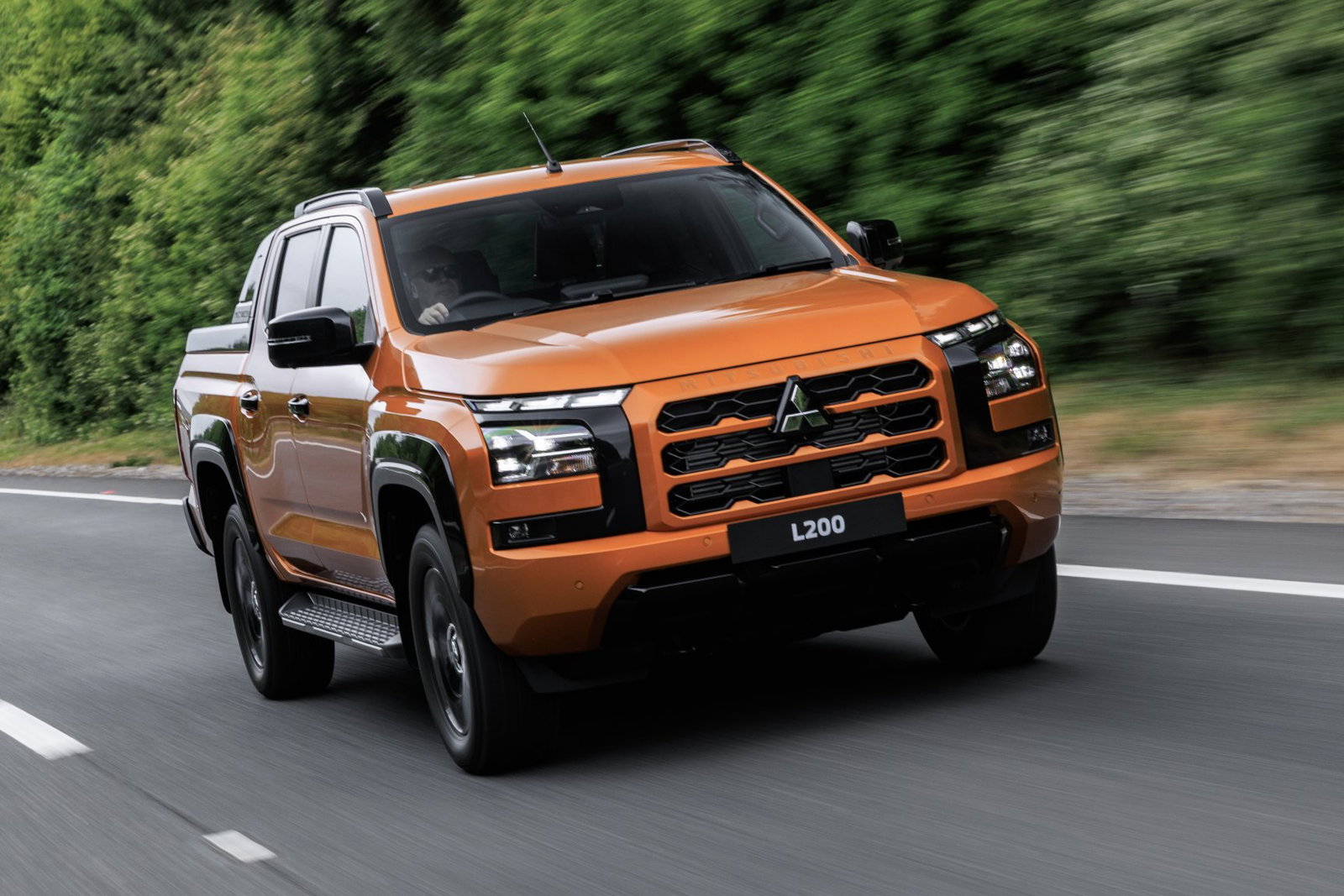 2026 Mitsubishi L200 - front, driving