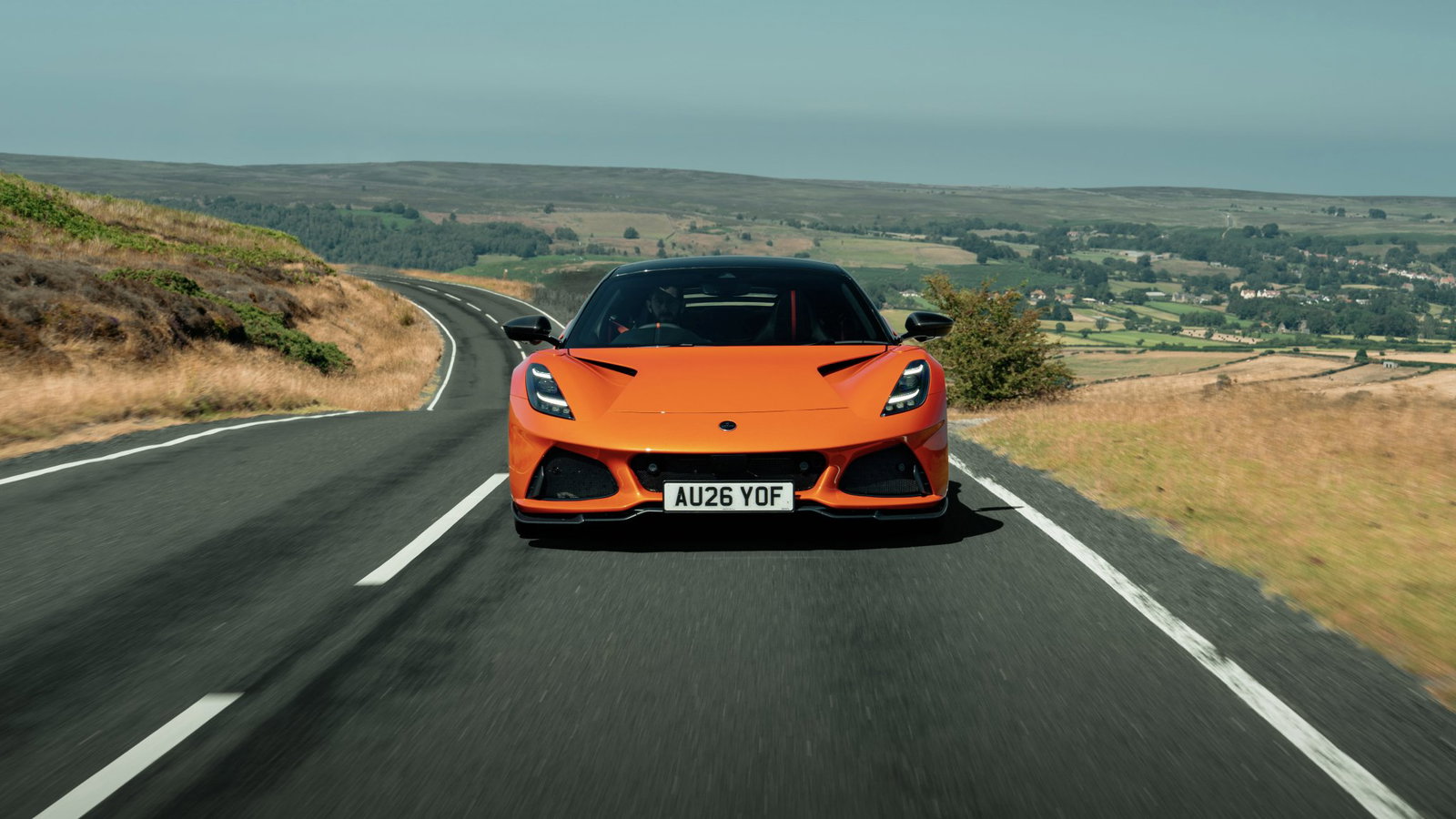 Lotus Emira 420 Sport - front, driving