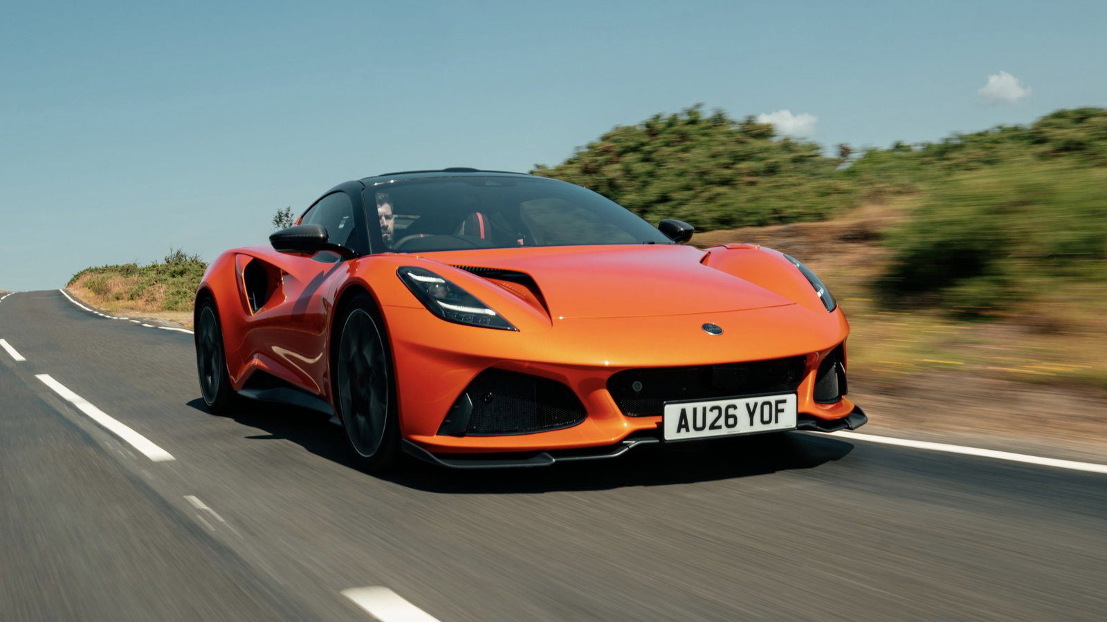 Lotus Emira 420 Sport - front, driving
