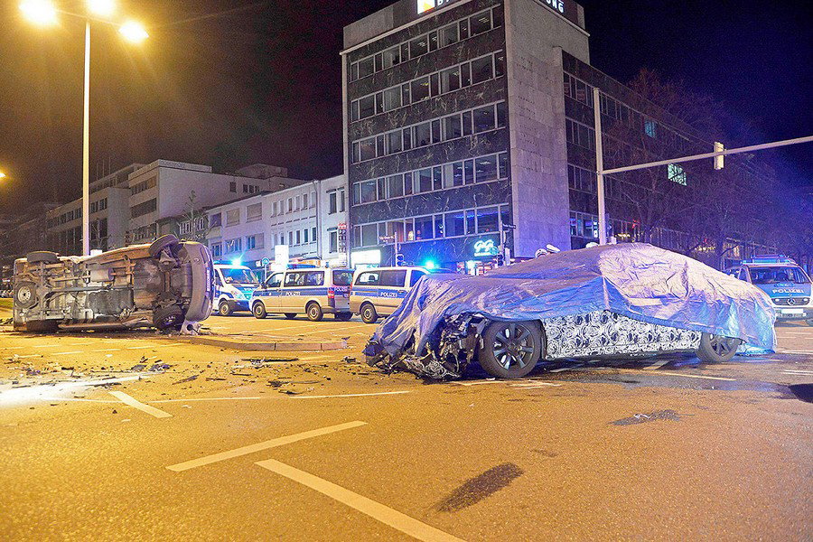 Watch The Moment A BMW 540i Kicks A Rock In This Guy's Face 