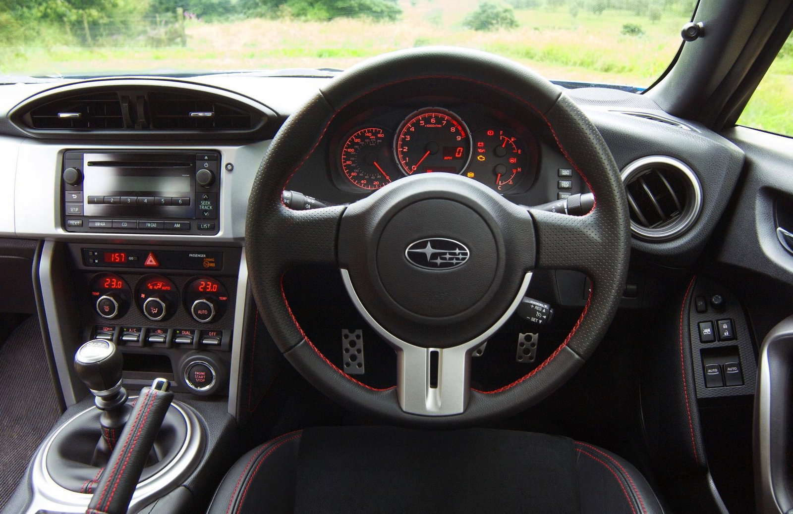 It's not the most exciting cockpit, and the Pioneer sat nav is infuriating, but get on a good bit of road and you won't want to be anywhere else