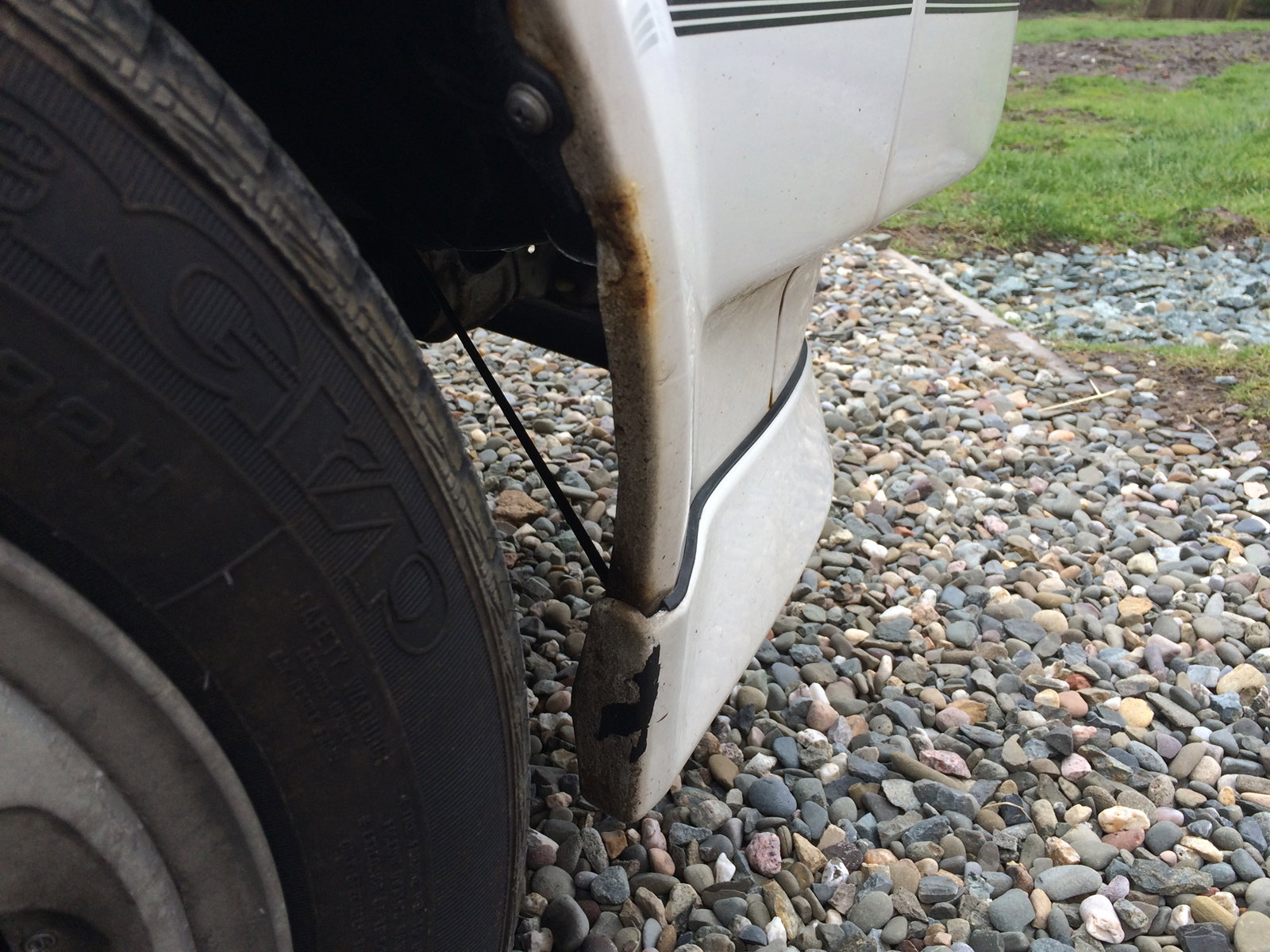 A salty winter has taken its toll on my paint - also note that the crossmember from the bumper to radiator is straight, if not this could be from crash damage