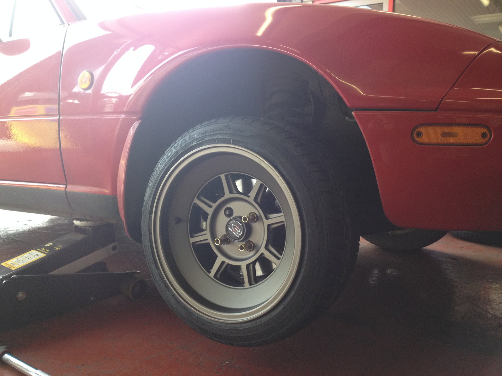 Wheel #1 is on. Just needs the final bolt