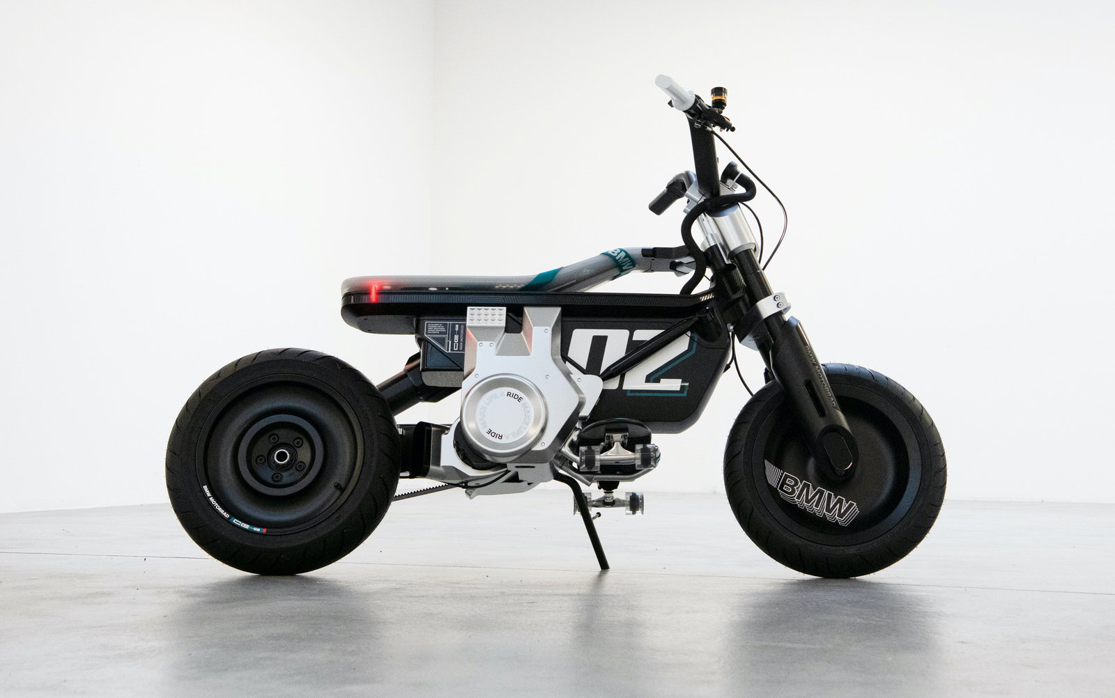 The BMW Concept CE 02 Is A Motorbike For The Future With A Skateboard Foot Rest