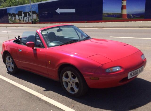 Questionable pearlescent paint, a set of Rover wheels and mis-matched tyres. Mmmm