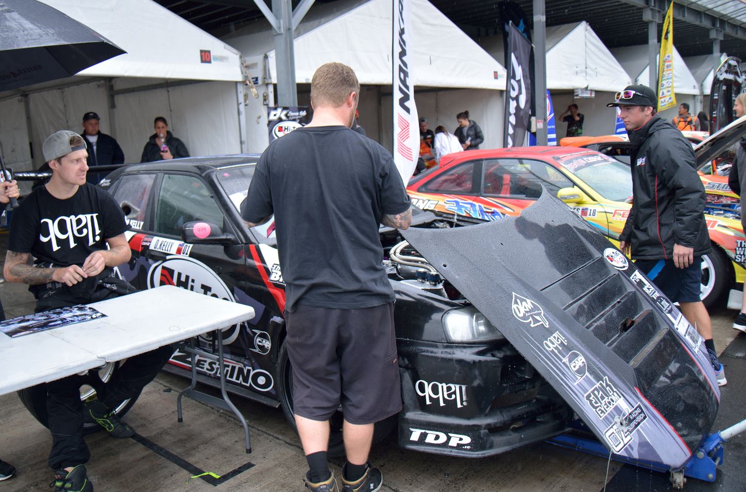 Darren Kelly signing next to his R34