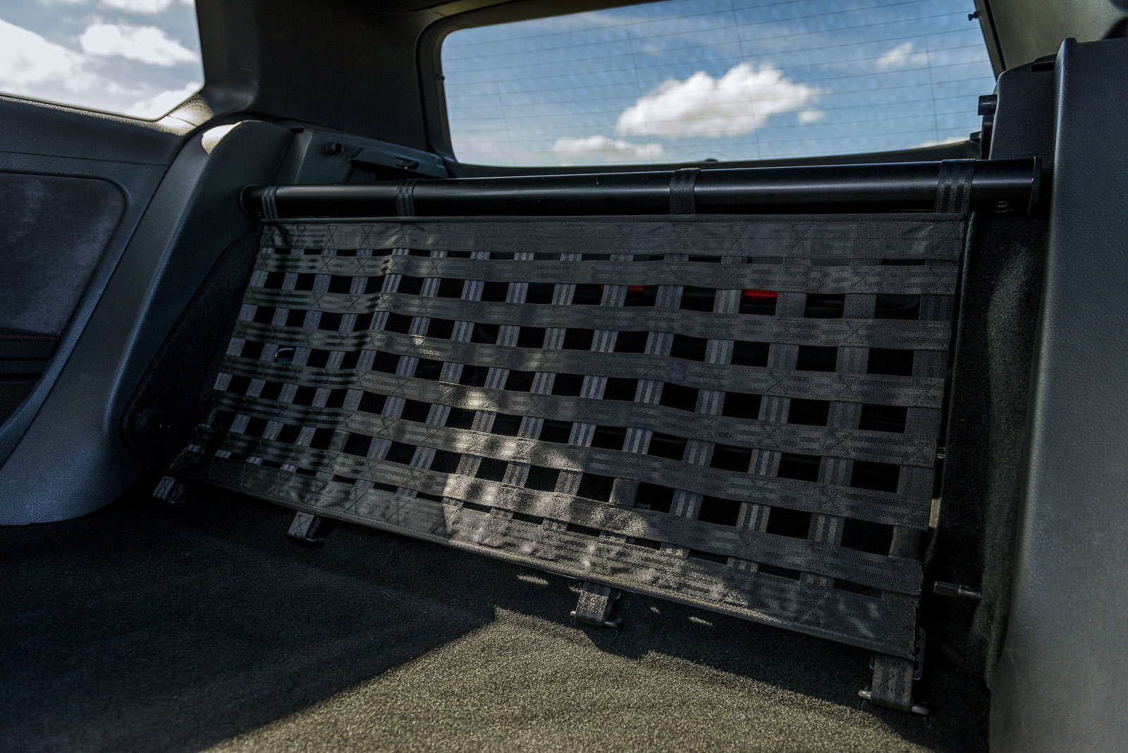 No rear seats in the Clubsport S. Instead, you get a cargo net and a metal bar - the latter a useful point to mount a harness if the mood takes you