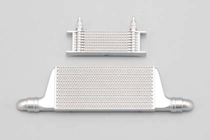 A size comparison between an oil cooler (top) and an intercooler (bottom)