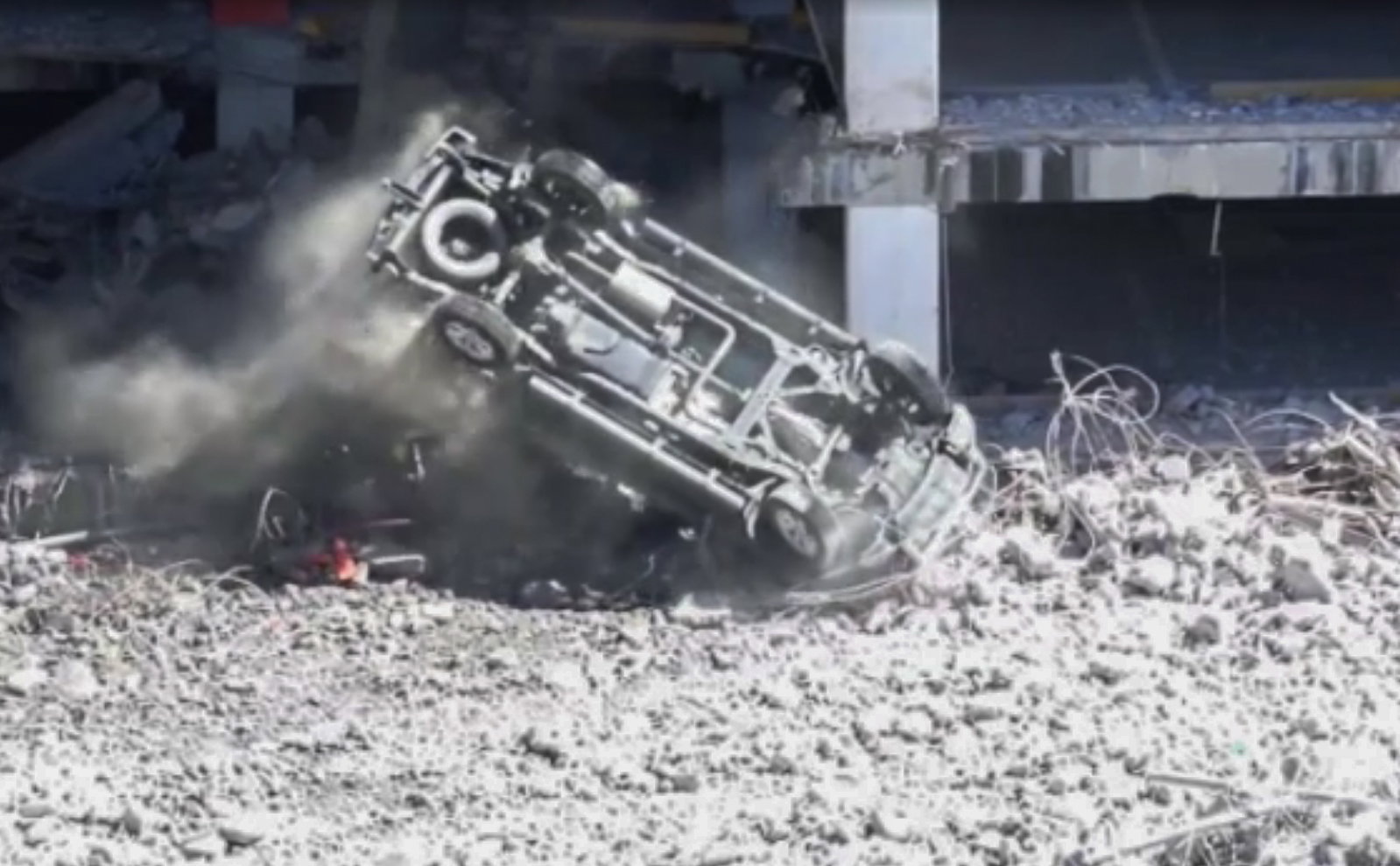 Watch A Demolition Arm Pluck A Navara From A Quake-Hit Multi-Storey Like A Toy