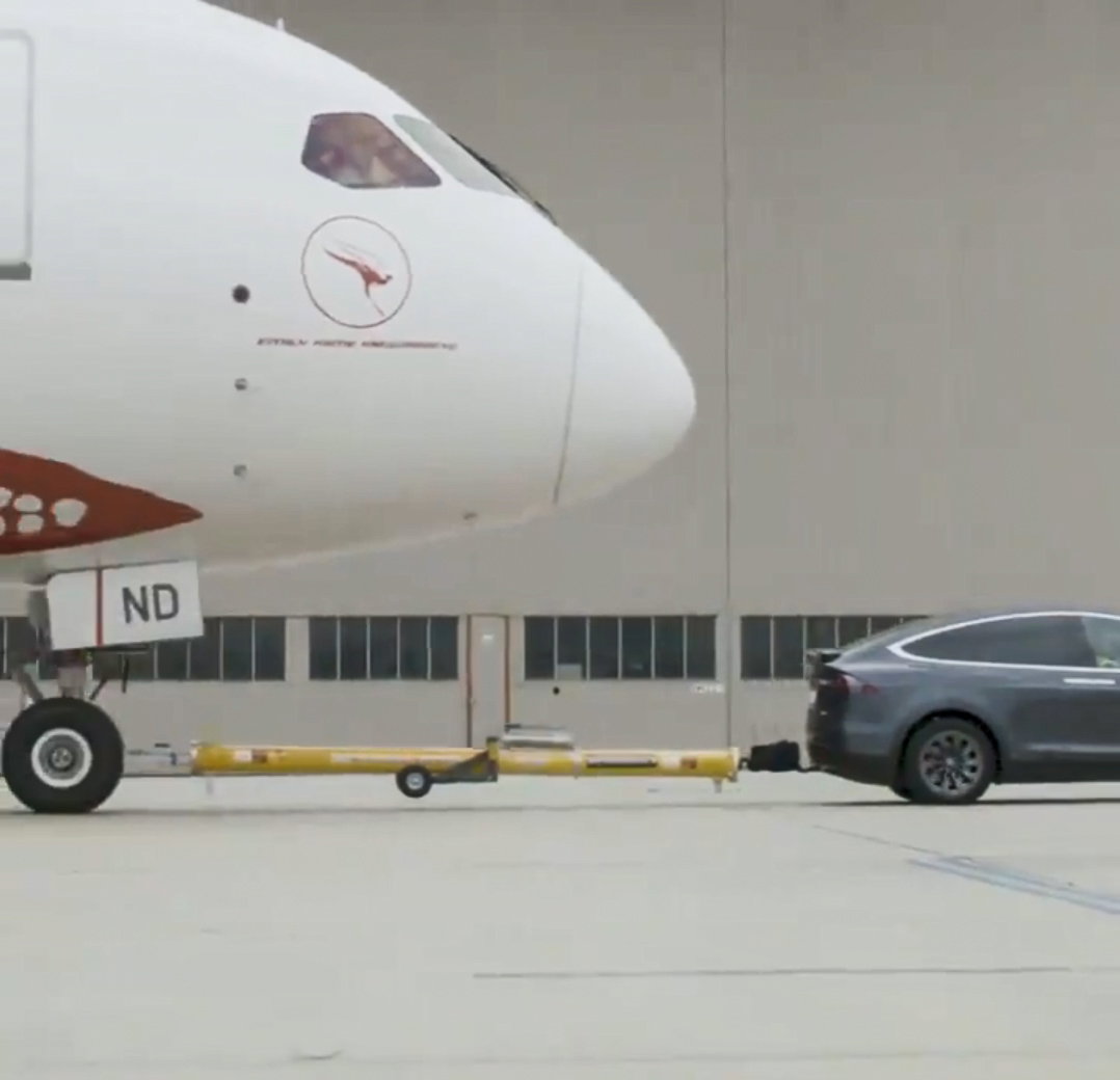 This Tesla Model X Pulling A Plane Is Absolutely Not A Distraction