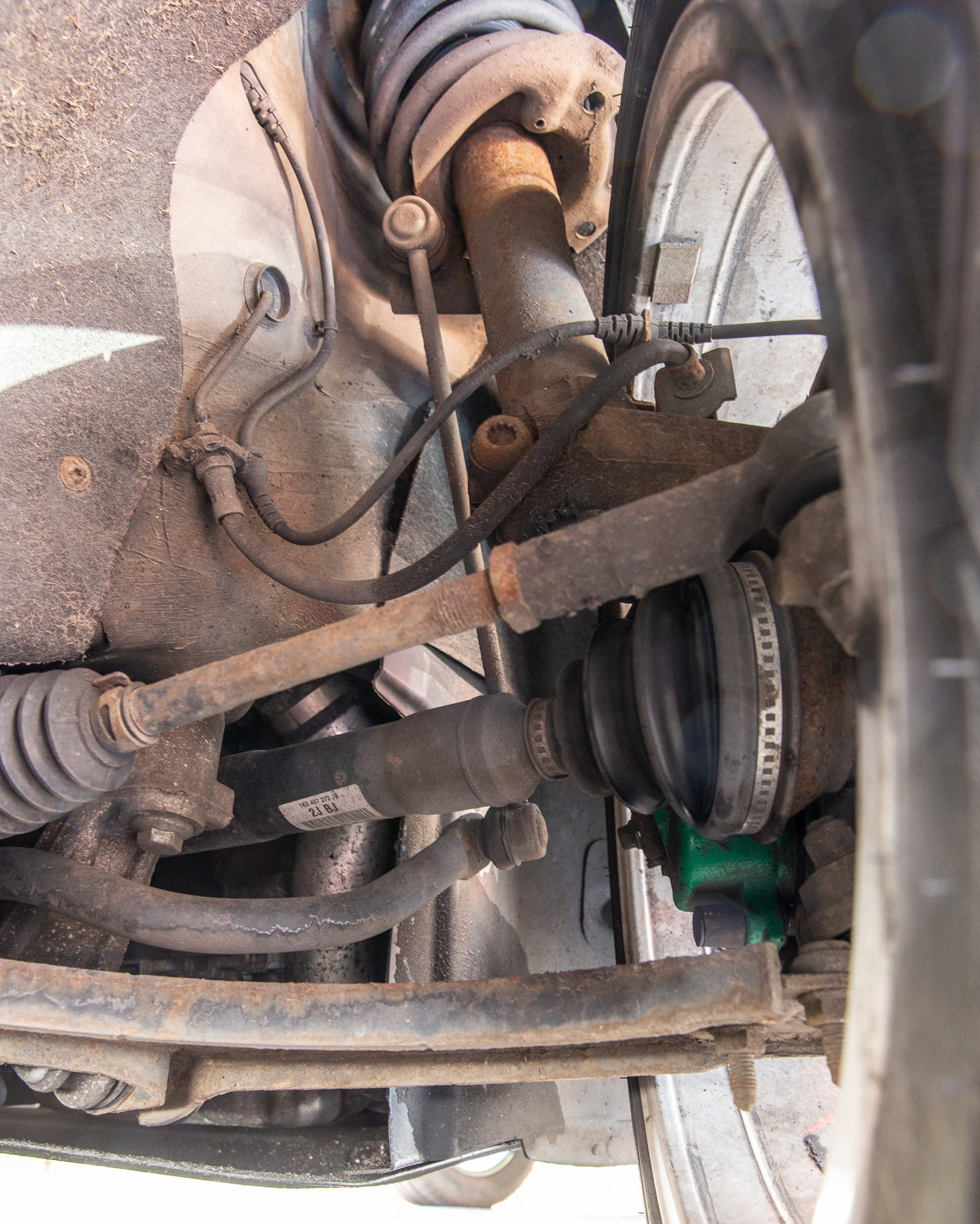 Suspension, top, control arm, bottom, drive shaft and steering arm