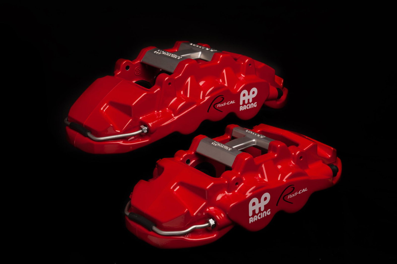 Six- and four-piston brake calipers