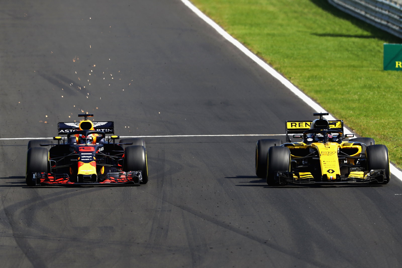 Daniel Ricciardo's Red Bull overtaking a slower Renault