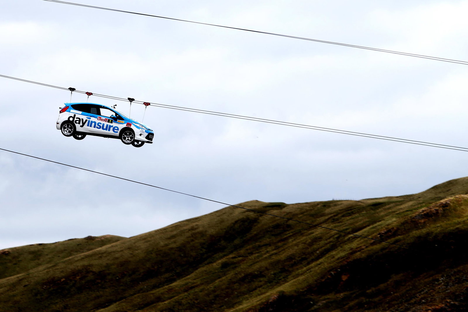 A Rally Car On A Zip Wire Is Today's Gold-Standard Jaw-Dropping Stunt