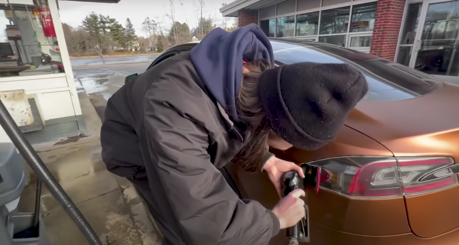 The fuel goes in where the charge port used to be, in case you're wondering